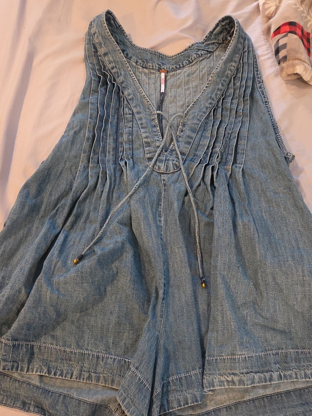 Free People Light Blue Denim Romper with Pleated V-Neck and Tie